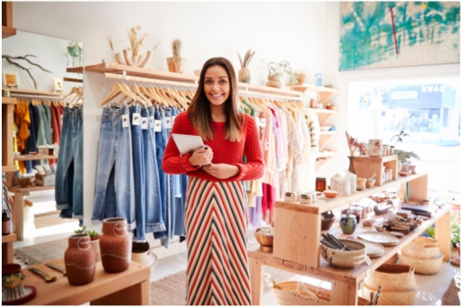 A woman in a red dress standing in a retail store