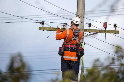 Personnel on utility pole