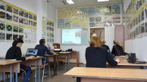 Students sitting at desks in a classroom