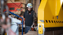 Industrial machinist working press